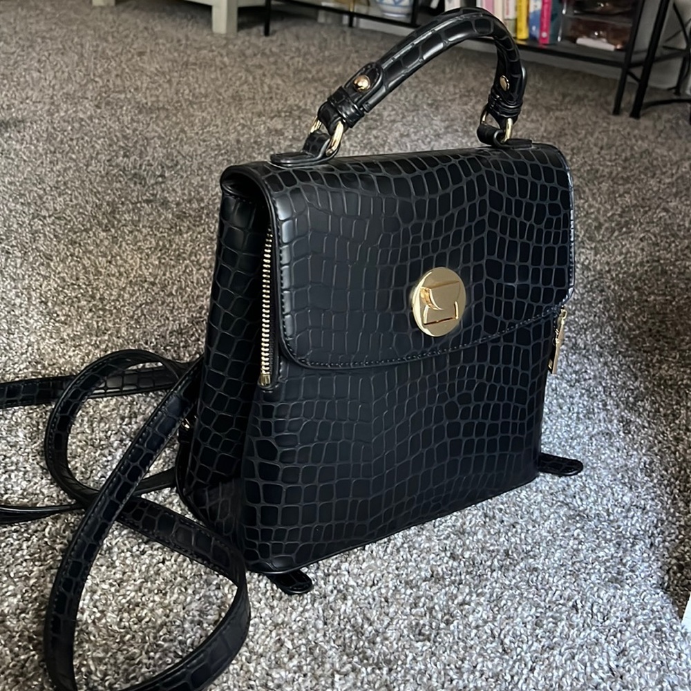 Black faux leather crocodile backpack gold hardware